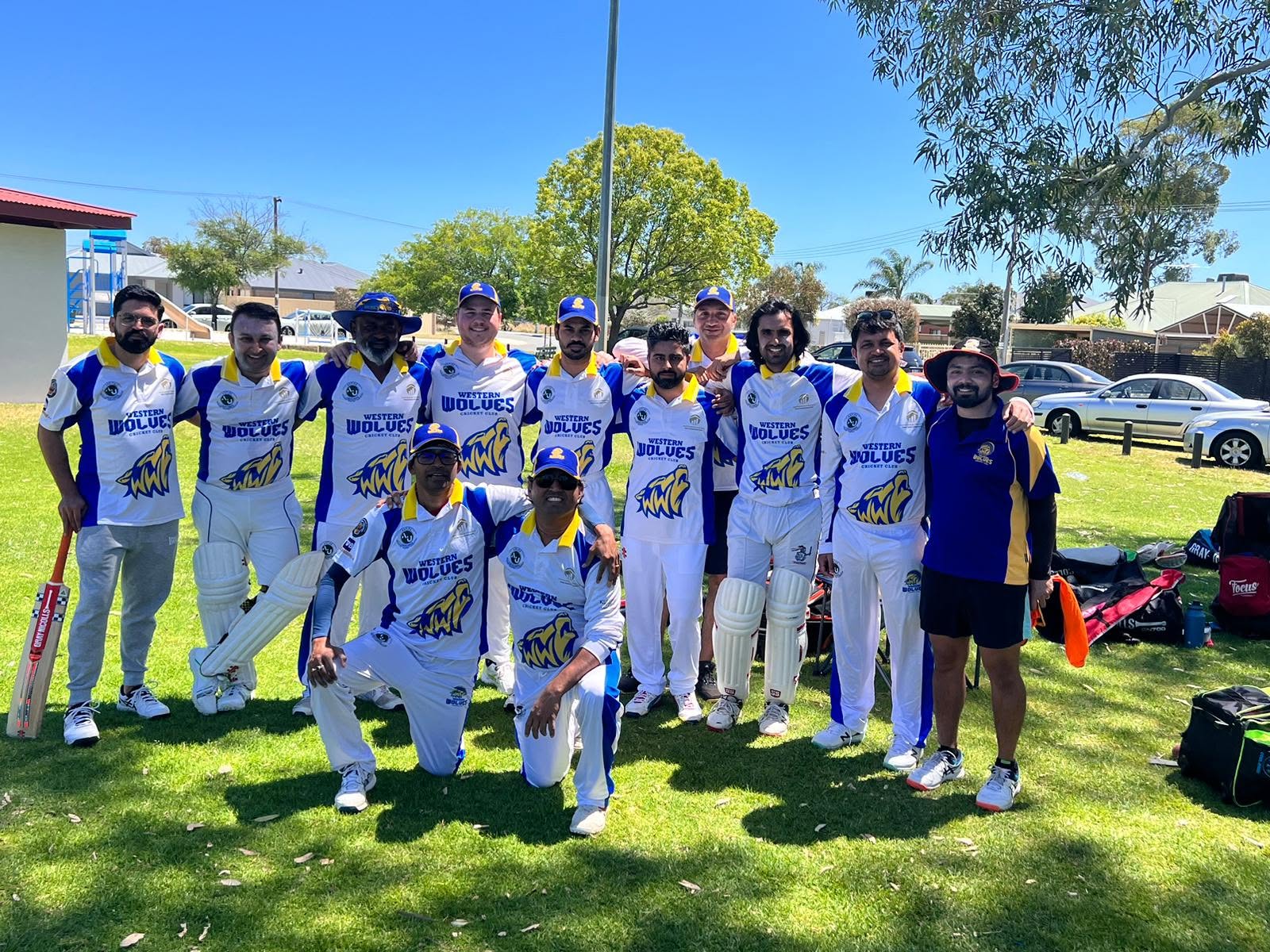Western Wolves players together on the cricket ground